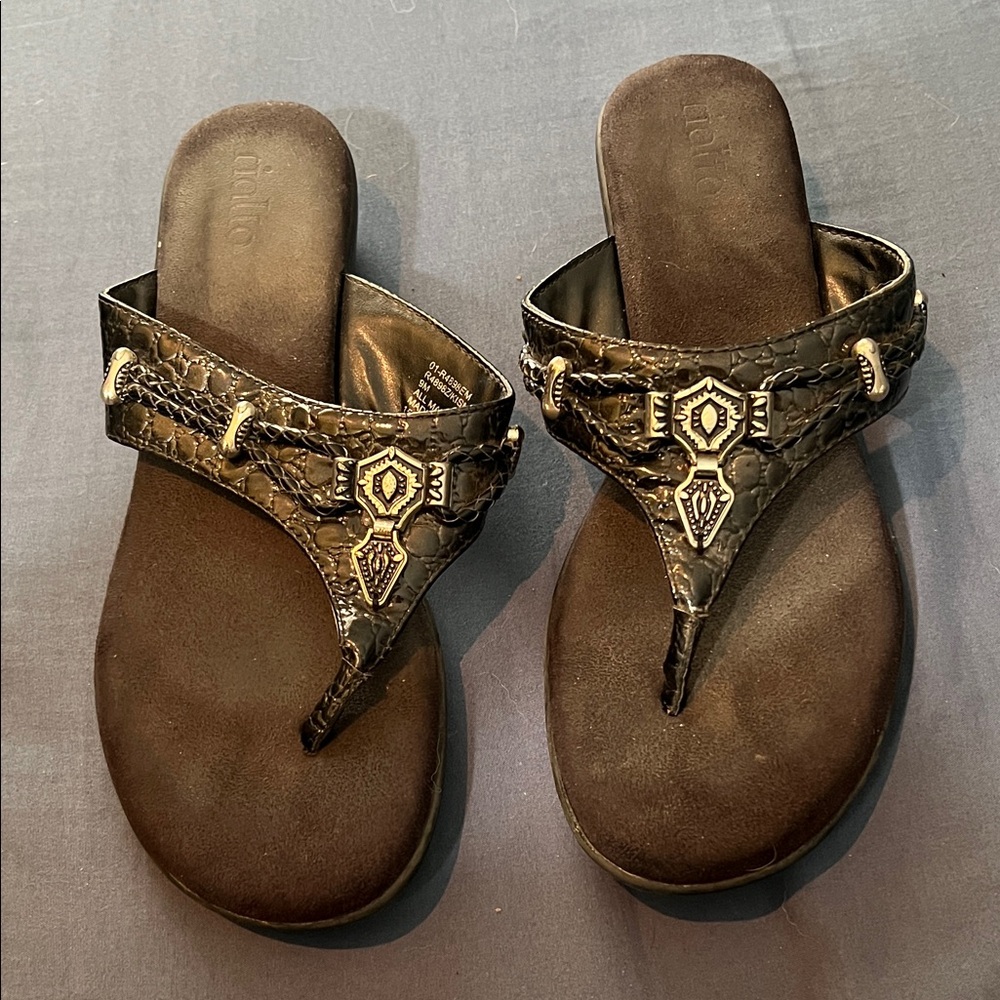 Sandals black silver accents, foot bed is so soft and comfortable, never worn